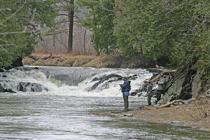 A group of fishermen on the Black River, in Coventry, Vermont